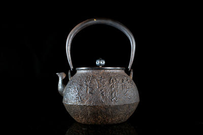 提詩花摘金鑲嵌提手鐵瓶