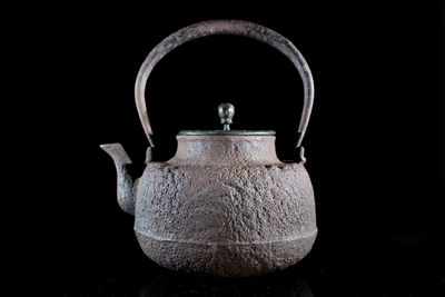 菊紋摘 窄口糙紋鐵瓶