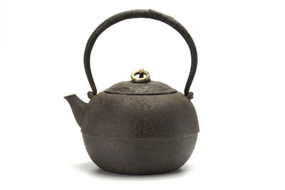 饕餮紋蓋銅摘丸形鉄瓶