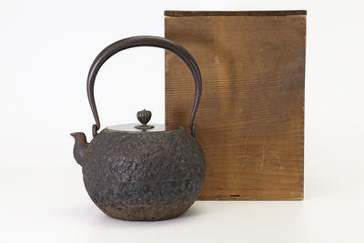 在銘 丸形巖肌鉄瓶（共箱）